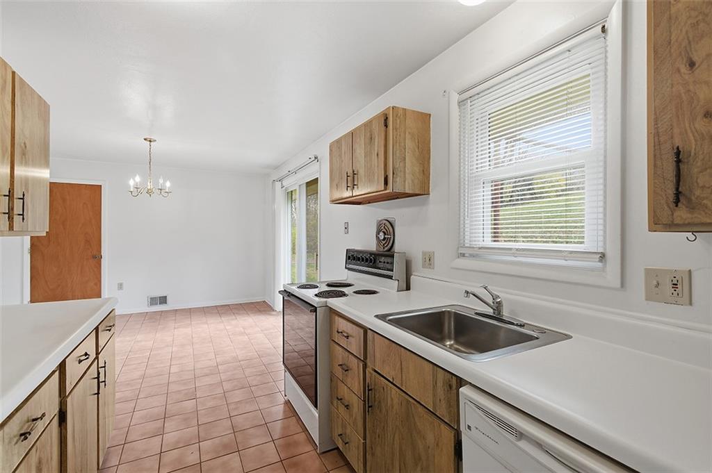 93 Stonesipher Road Oakdale, PA 15071 - Photo 16 of 36 a kitchen that has a sink cabinets counter space and appliances