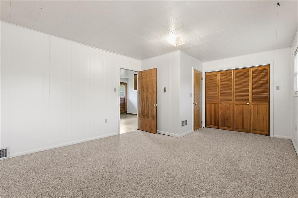 93 Stonesipher Road Oakdale, PA 15071 - Photo 28 of 36 a view of an empty room with a window