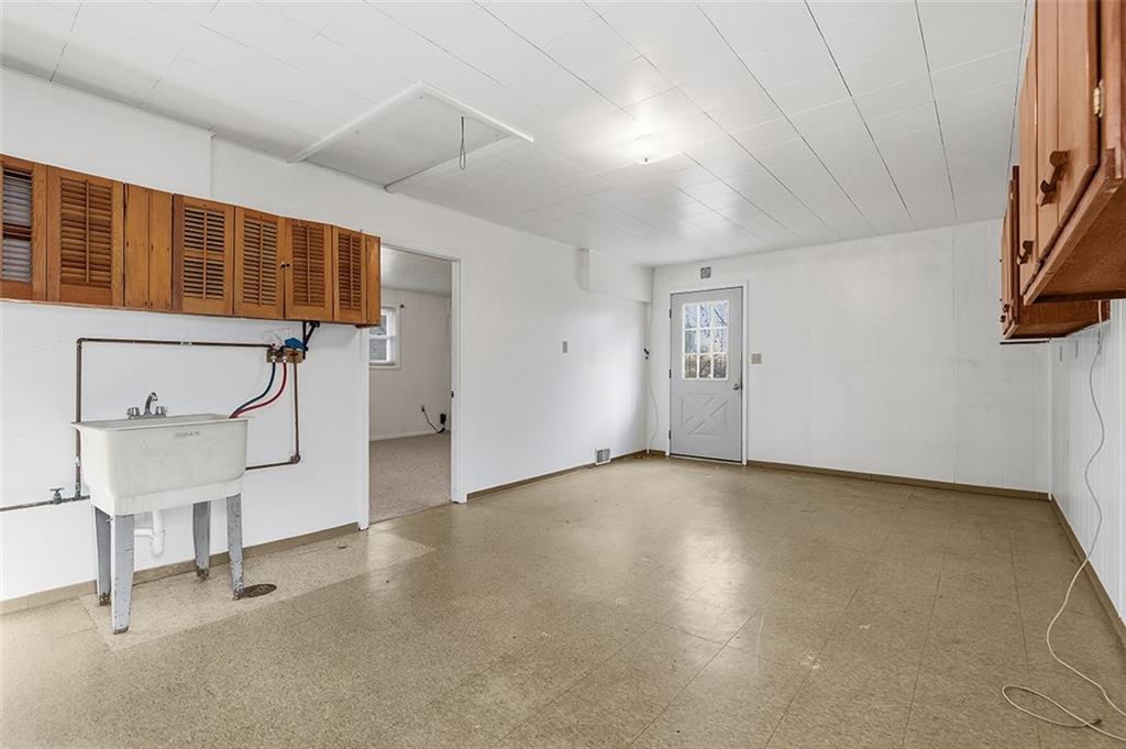 93 Stonesipher Road Oakdale, PA 15071 - Photo 32 of 36 a view of an empty room with a window