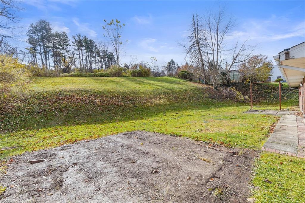 93 Stonesipher Road Oakdale, PA 15071 - Photo 35 of 36 a view of a swimming pool with an outdoor space and seating area