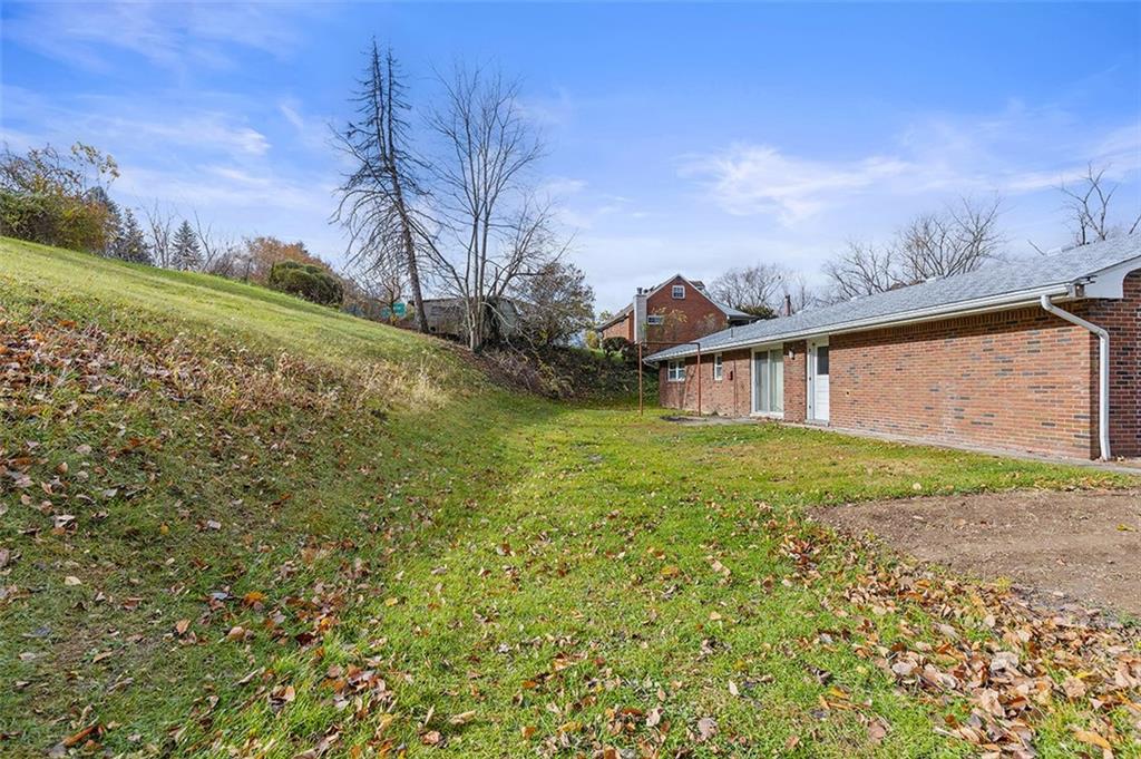93 Stonesipher Road Oakdale, PA 15071 - Photo 36 of 36 a view of a backyard with plants and large trees