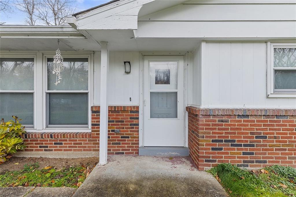 93 Stonesipher Road Oakdale, PA 15071 - Photo 6 of 36 a front view of a house with a garden