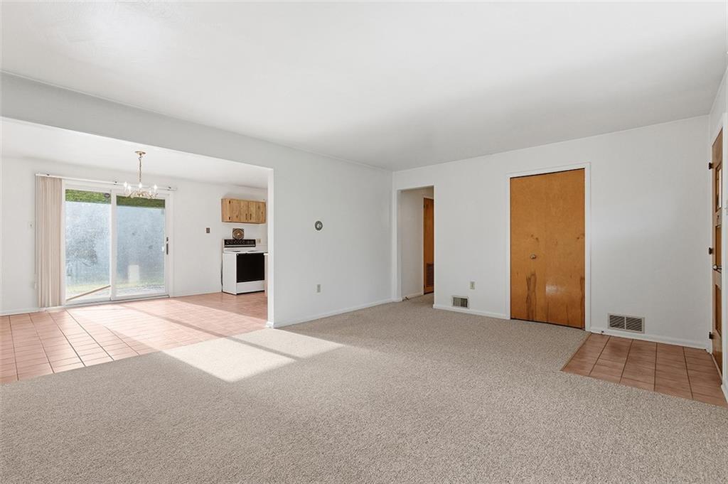 93 Stonesipher Road Oakdale, PA 15071 - Photo 10 of 36 a view of an empty room with a window