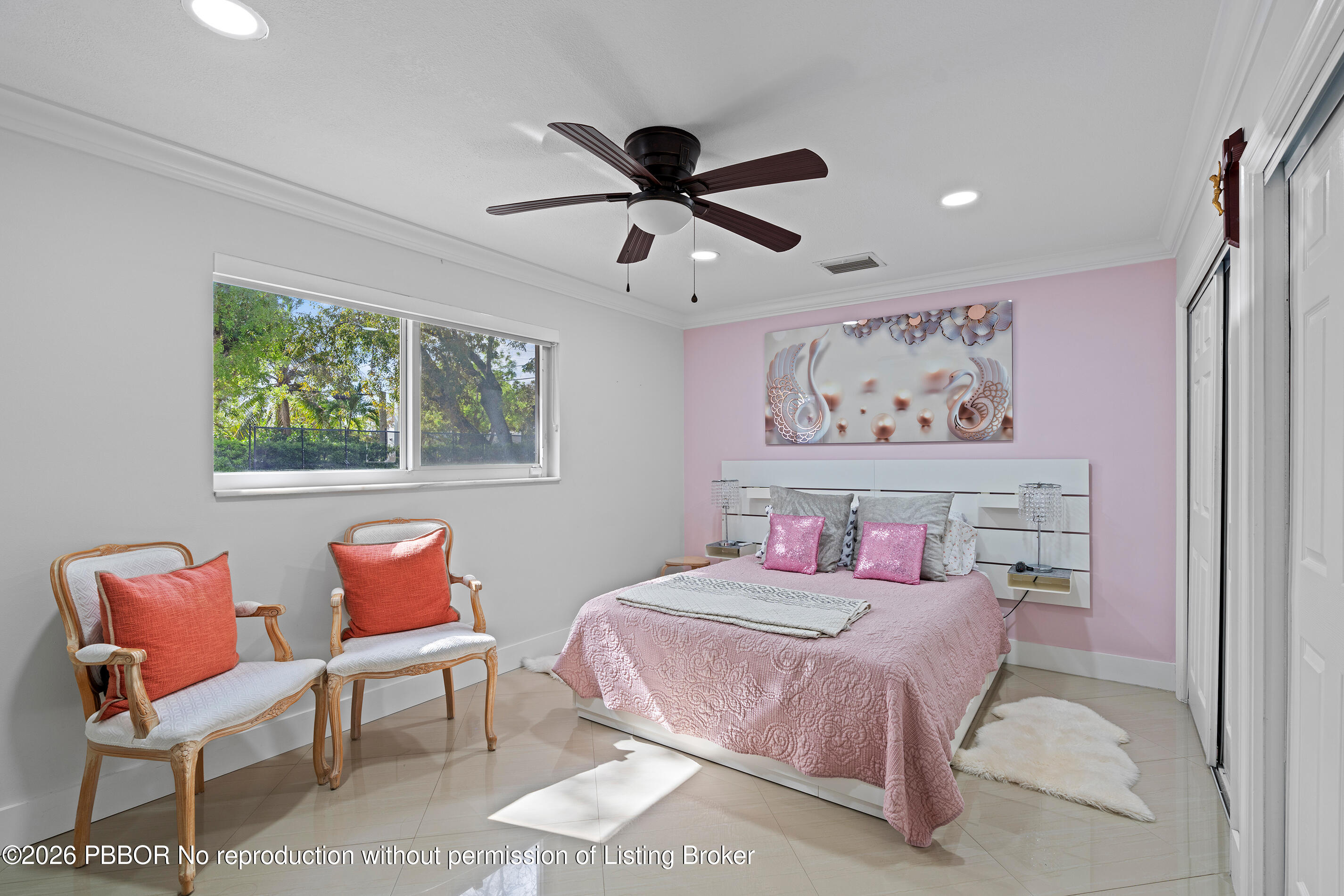 747 Avon Road West Palm Beach, FL 33401 - Photo 11 of 29 a bedroom with furniture and a window