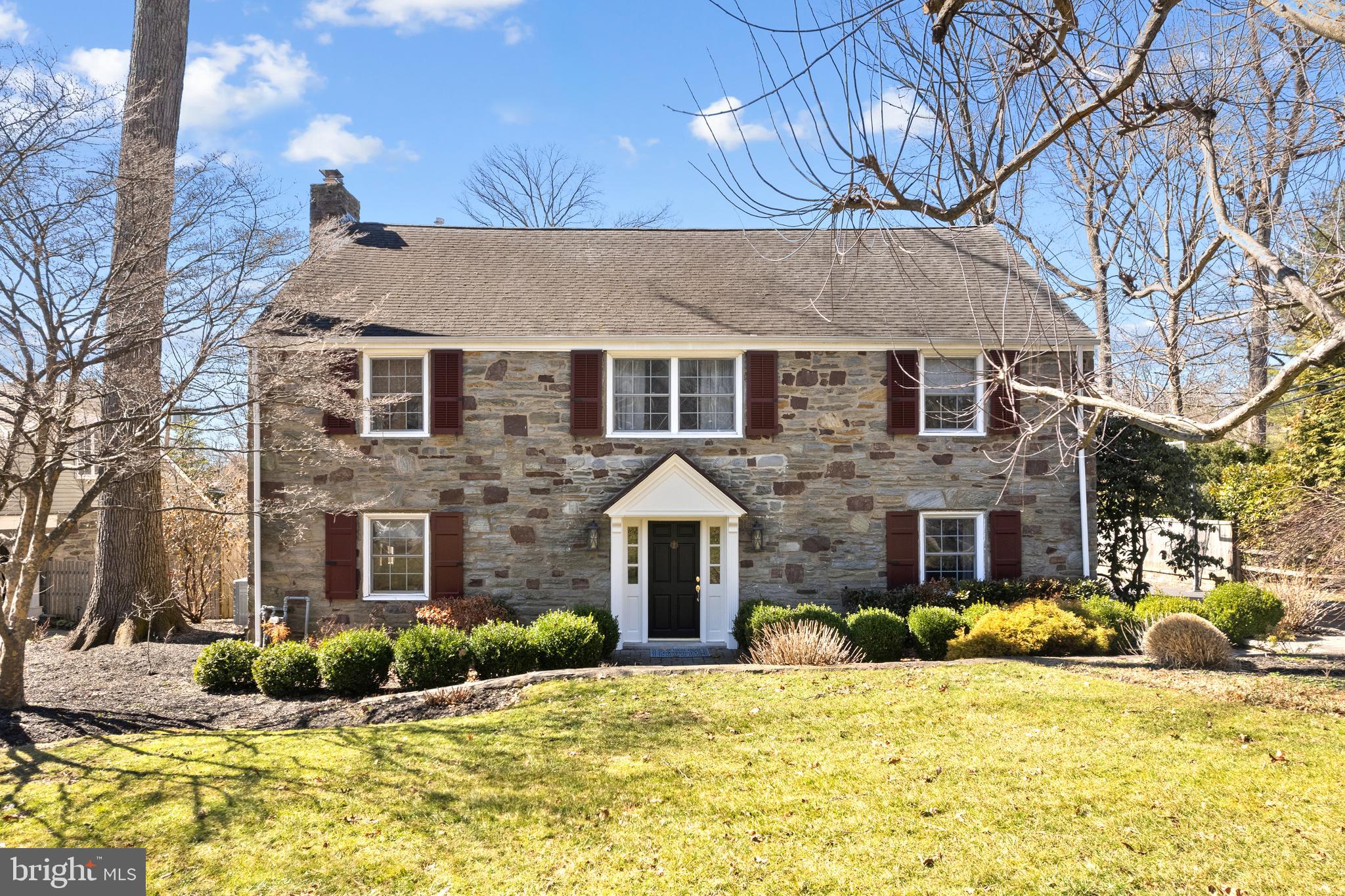 3 Briar Road Wayne, PA 19087 - Photo 1 of 48 a view of a brick house with a yard chairs and large tree