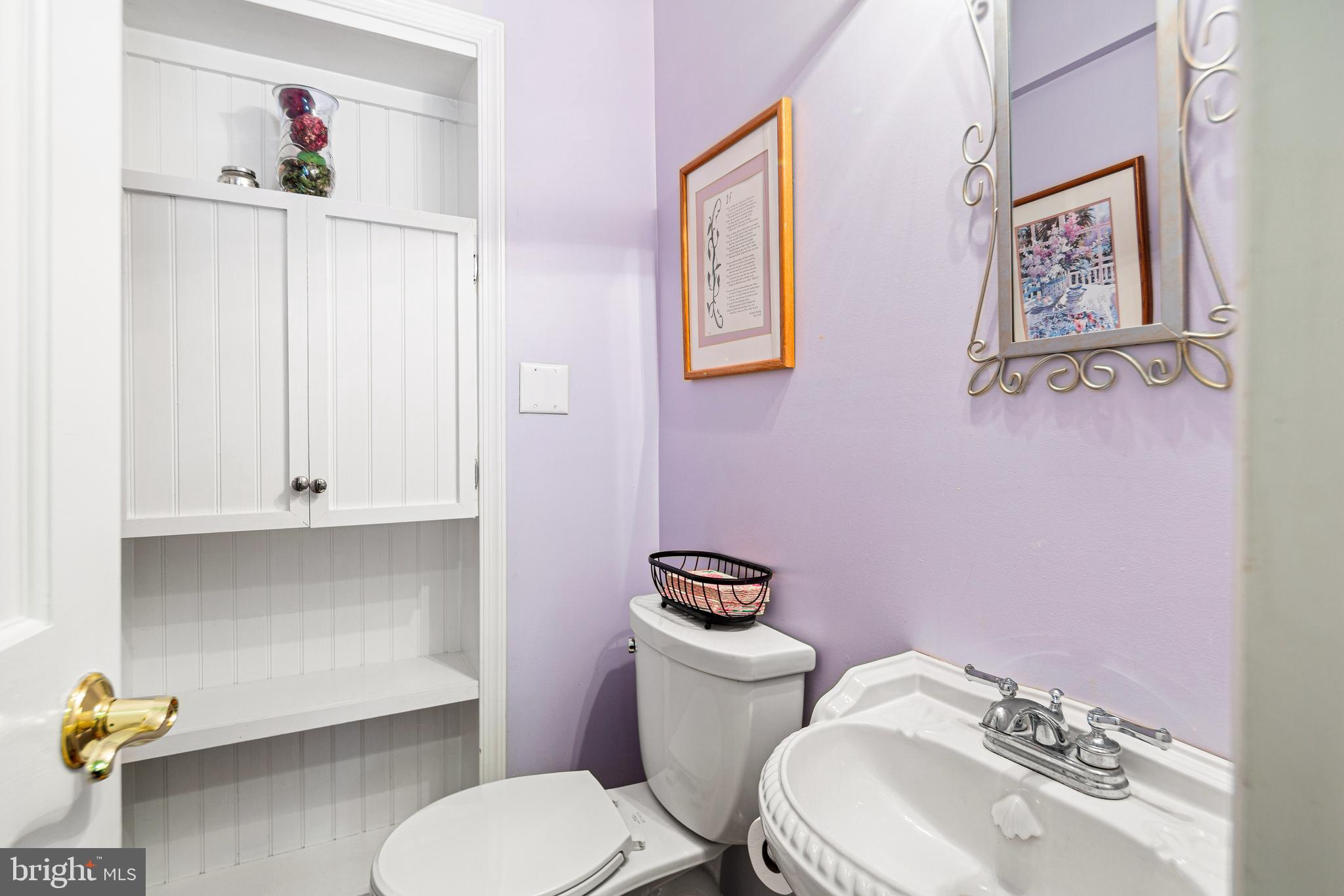 3 Briar Road Wayne, PA 19087 - Photo 14 of 48 a white toilet sitting next to a bathroom sink