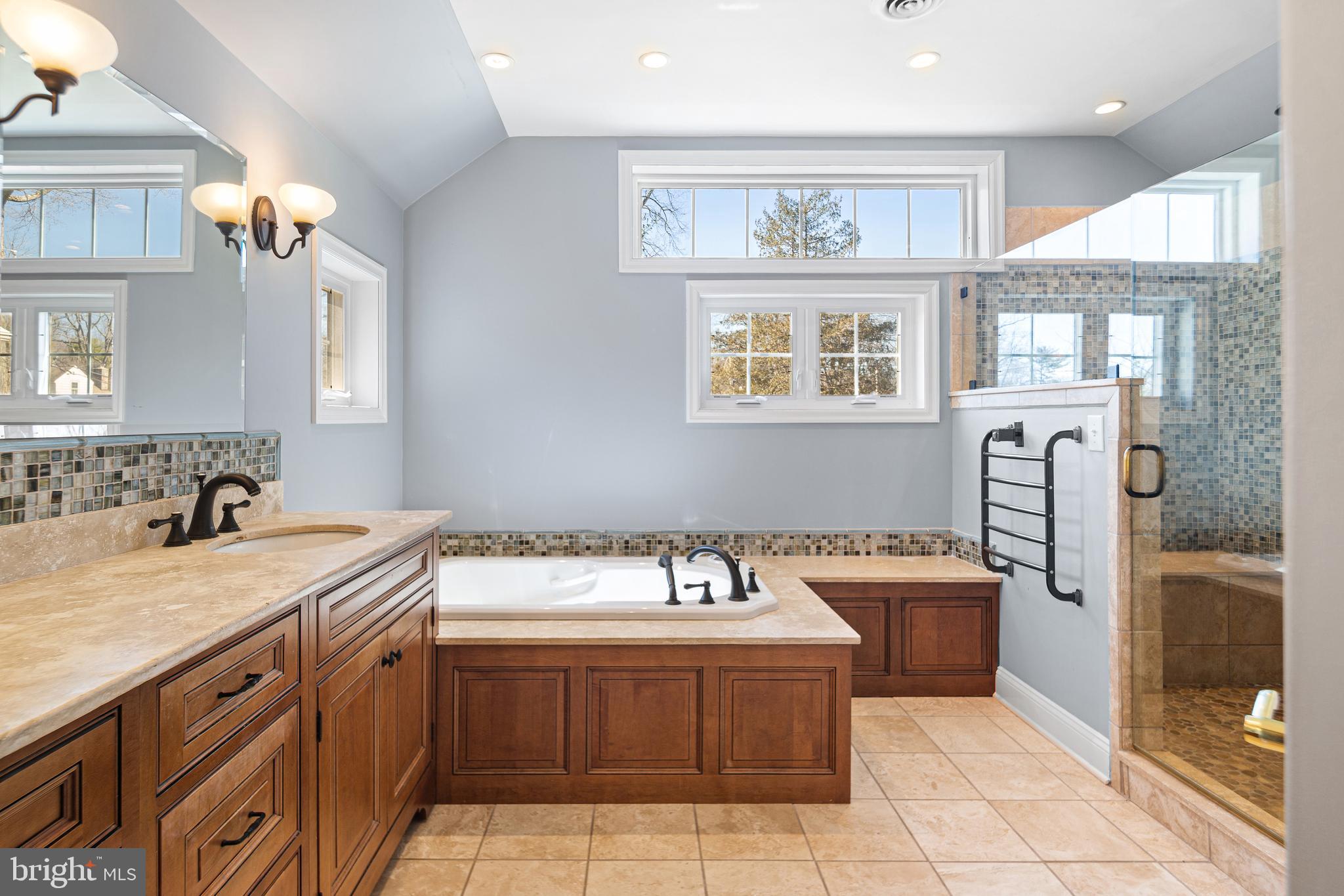 3 Briar Road Wayne, PA 19087 - Photo 21 of 48 a spacious bathroom with a tub sink and mirror