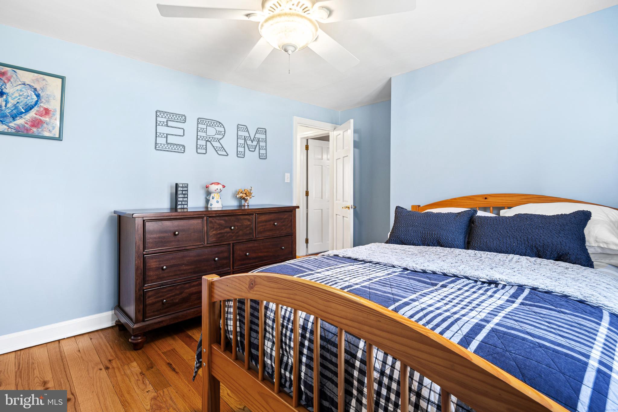 3 Briar Road Wayne, PA 19087 - Photo 25 of 48 a bedroom with a bed and a dresser in it