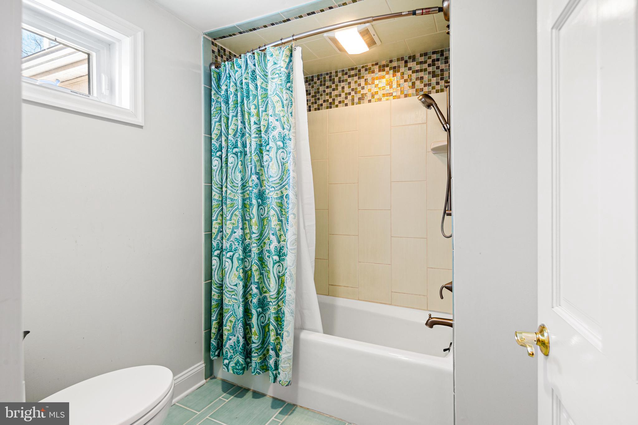 3 Briar Road Wayne, PA 19087 - Photo 36 of 48 a bathroom with a toilet and a bathtub