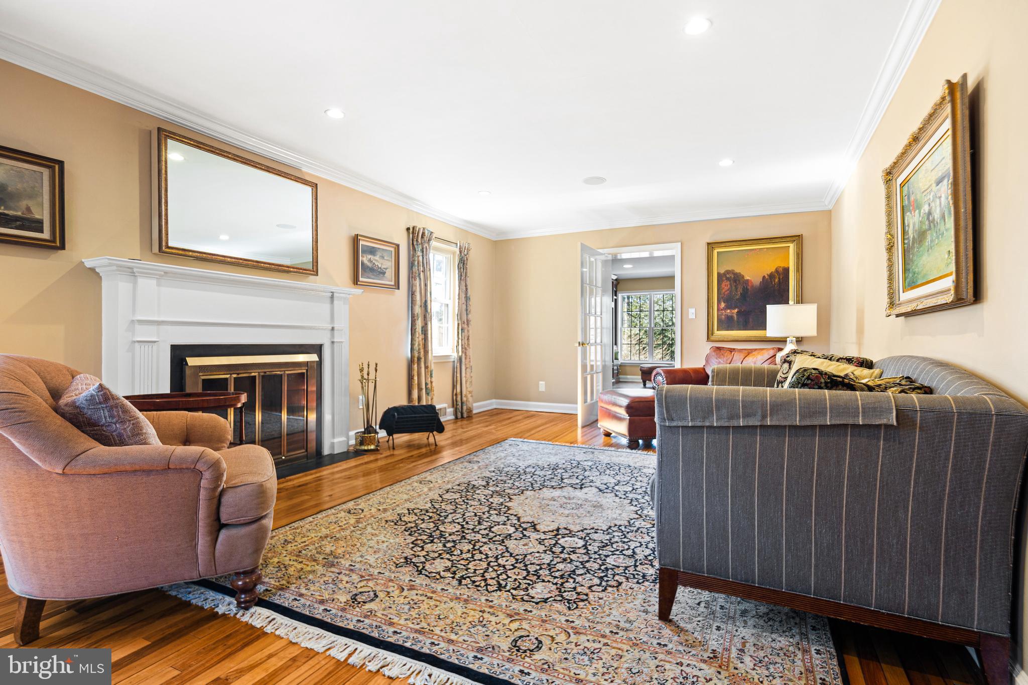 3 Briar Road Wayne, PA 19087 - Photo 4 of 48 a living room with furniture windows and a fireplace