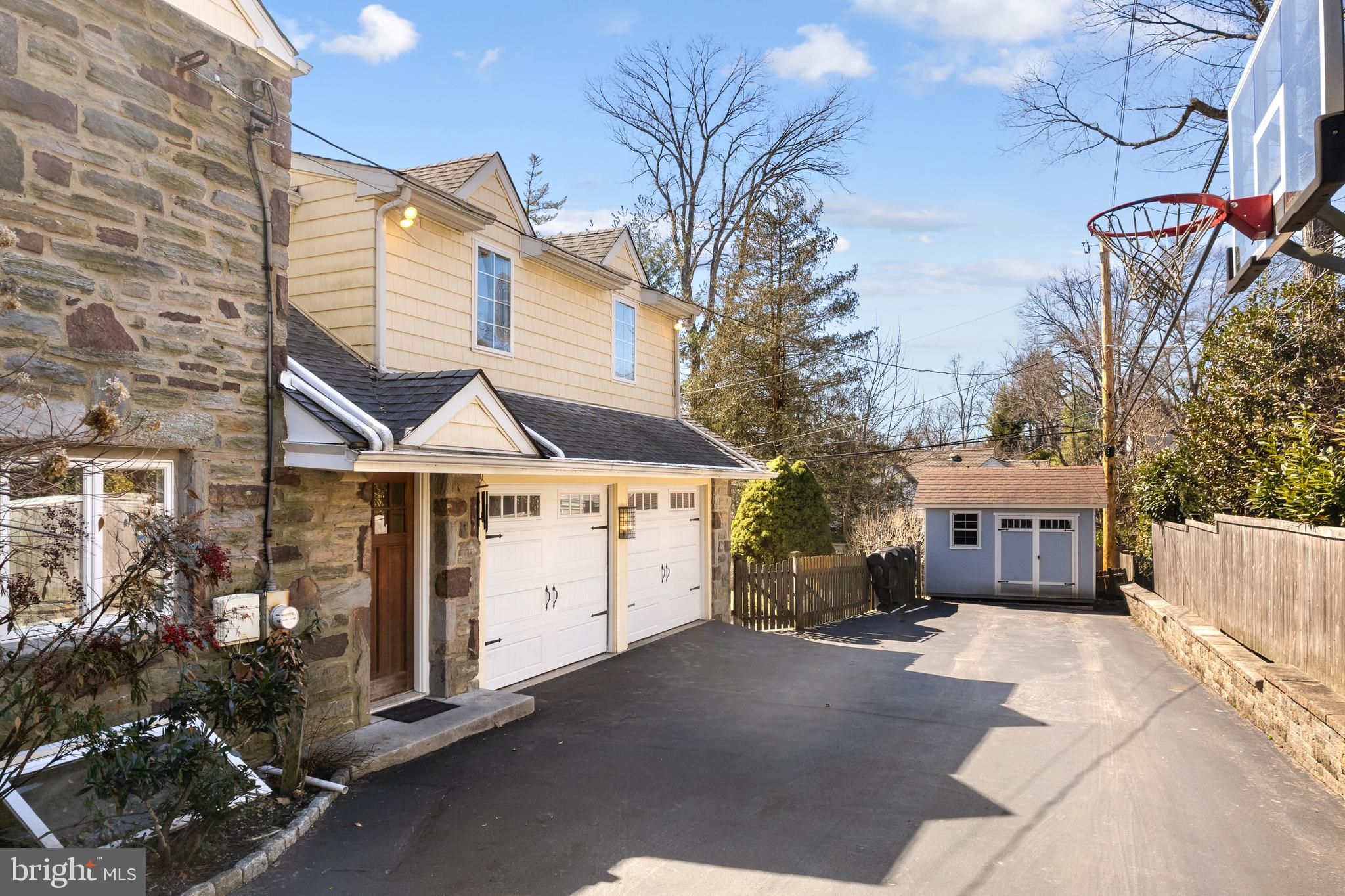 3 Briar Road Wayne, PA 19087 - Photo 45 of 48 a front view of a house with a garage