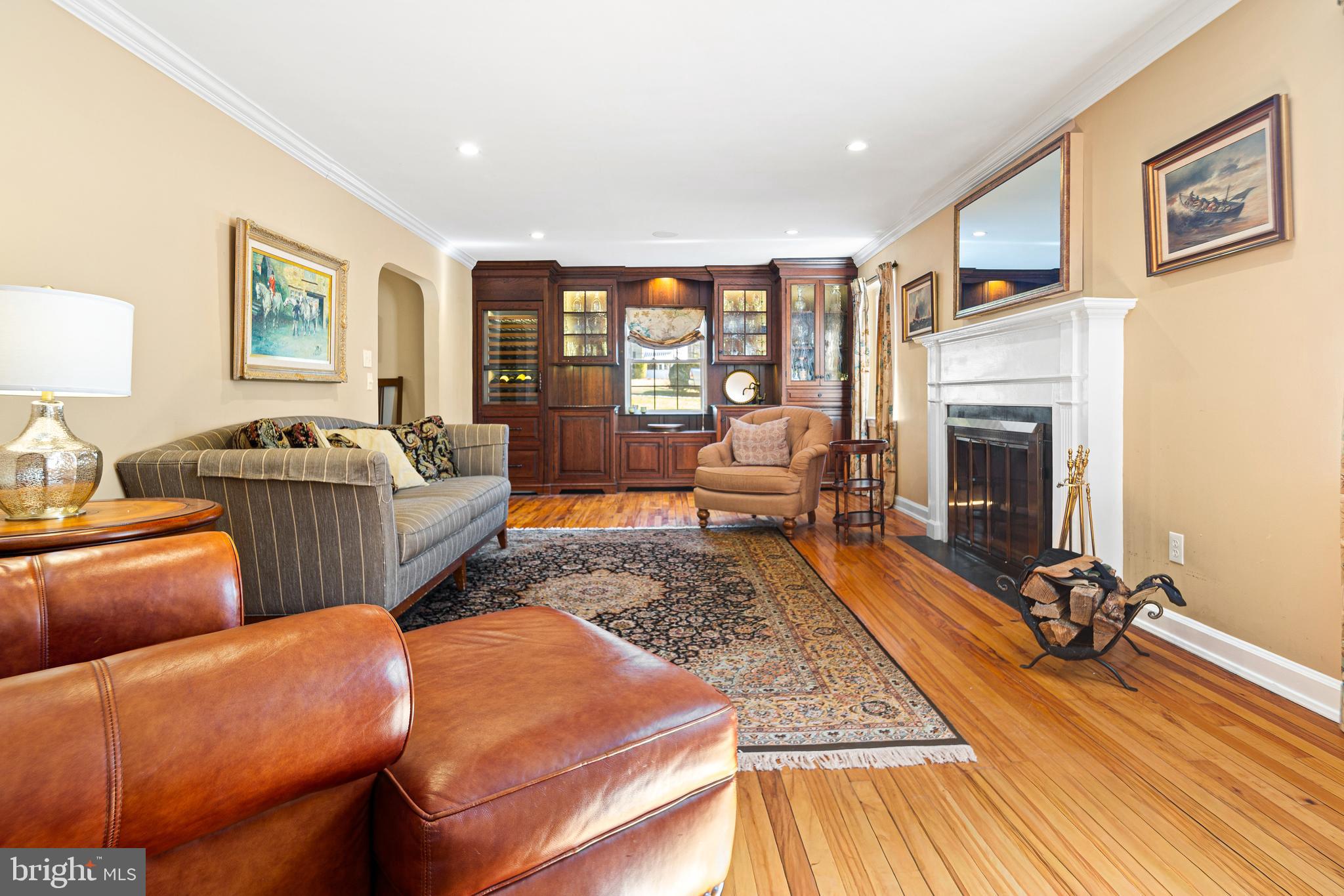 3 Briar Road Wayne, PA 19087 - Photo 5 of 48 a living room with furniture fireplace and flat screen tv