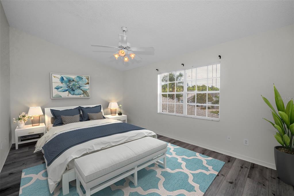 271 Hemingway Drive Oldsmar, FL 34677 - Photo 14 of 31 a bedroom with a bed and a window
