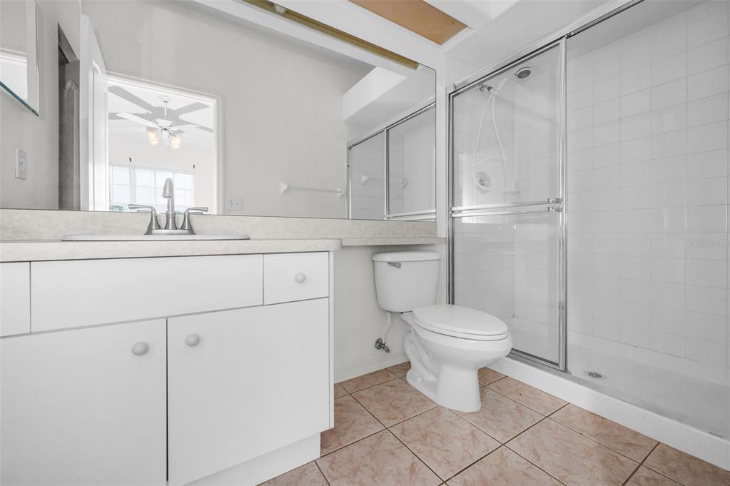 271 Hemingway Drive Oldsmar, FL 34677 - Photo 16 of 31 a bathroom with a sink toilet and a mirror