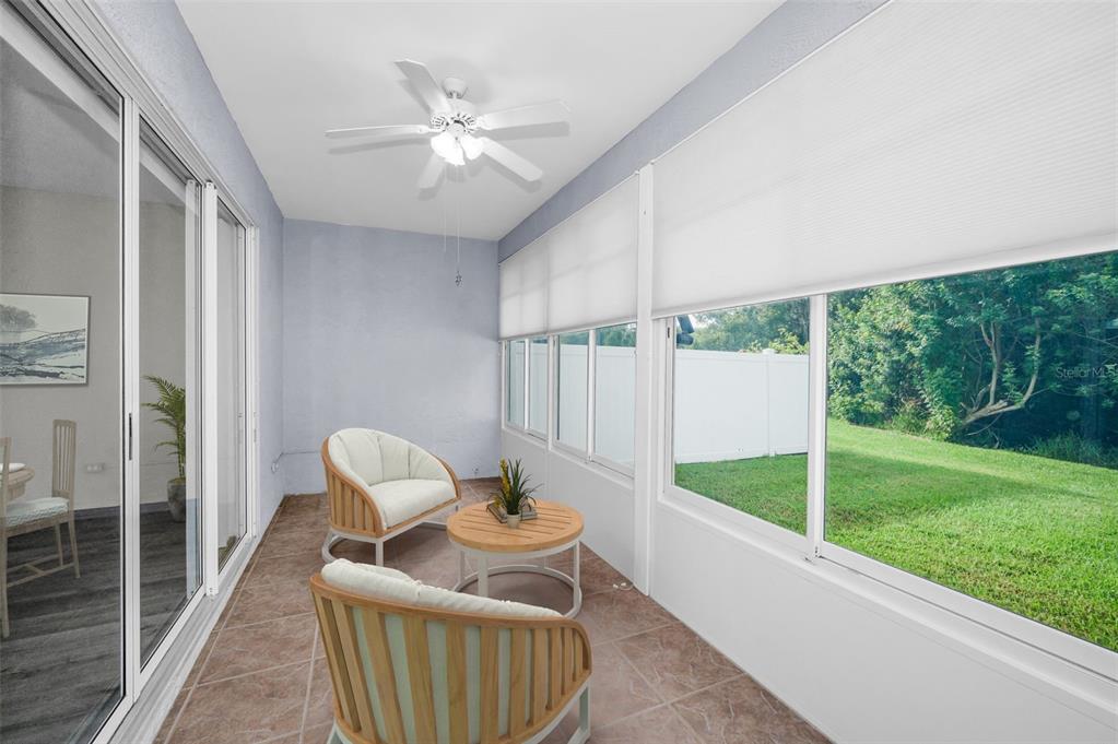 271 Hemingway Drive Oldsmar, FL 34677 - Photo 22 of 31 a living room with furniture and a garden