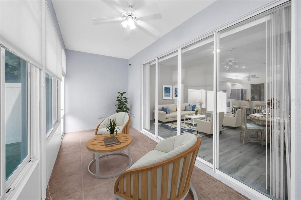 271 Hemingway Drive Oldsmar, FL 34677 - Photo 23 of 31 a dining room with furniture a glass door and chandelier