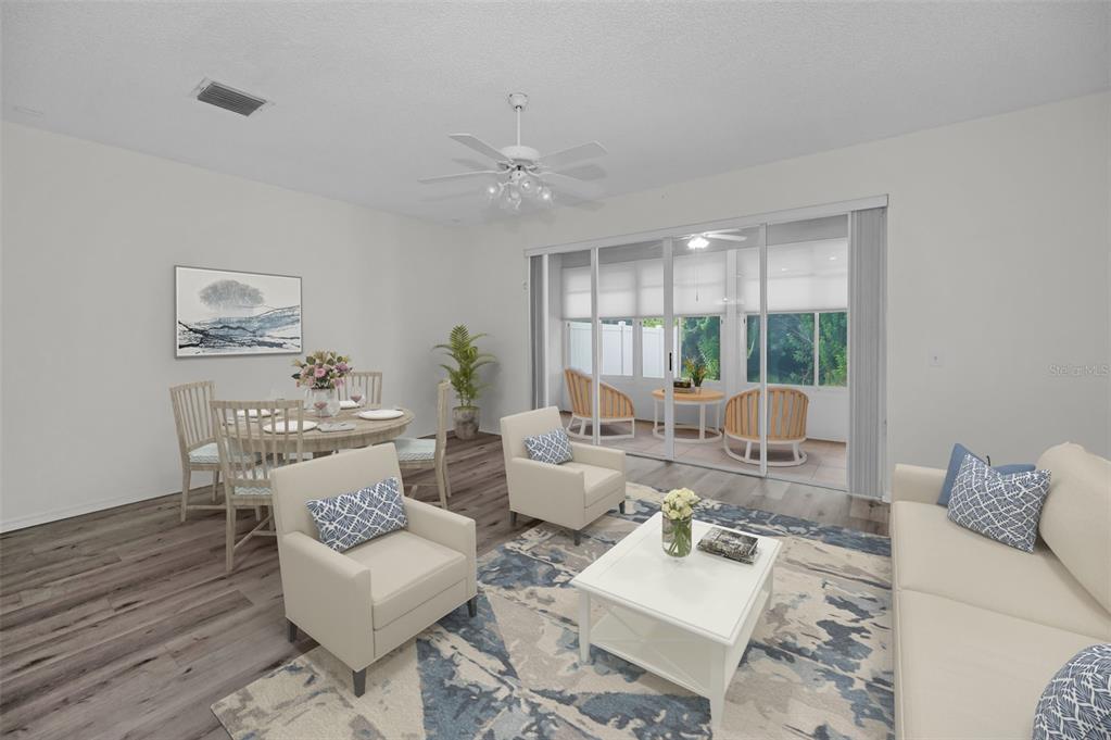 271 Hemingway Drive Oldsmar, FL 34677 - Photo 6 of 31 a living room with furniture and wooden floor