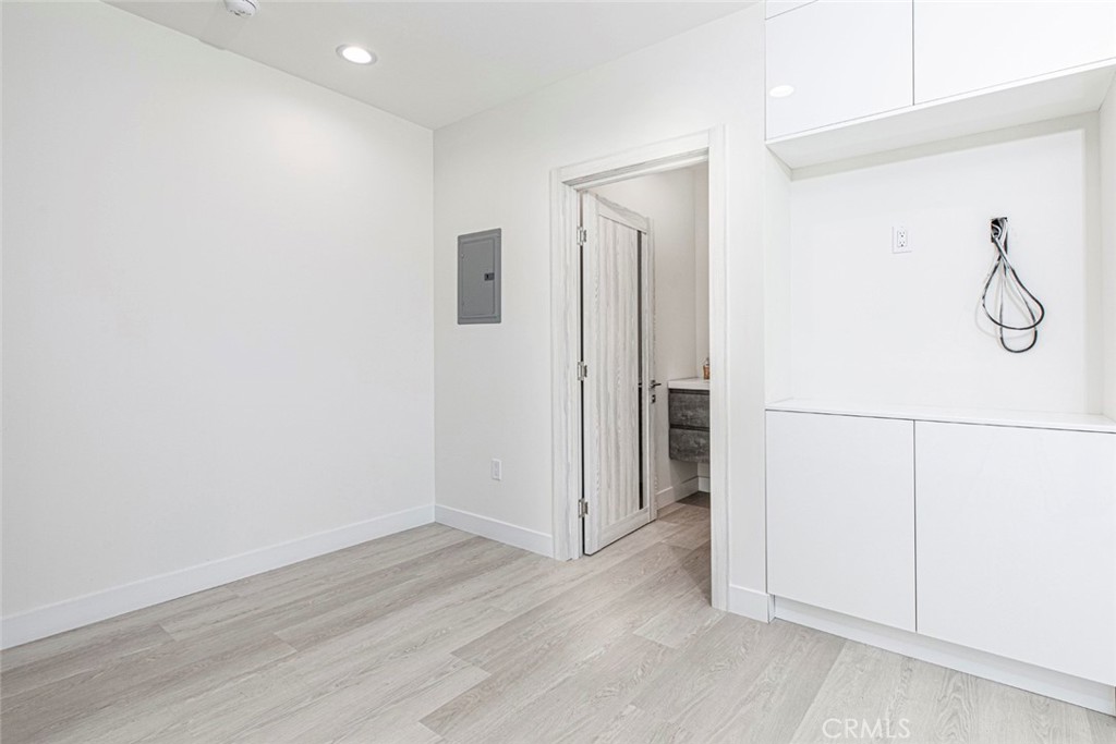 7446 Mammoth Avenue Van Nuys, CA 91405 - Photo 12 of 30 a view of small space with wooden floor