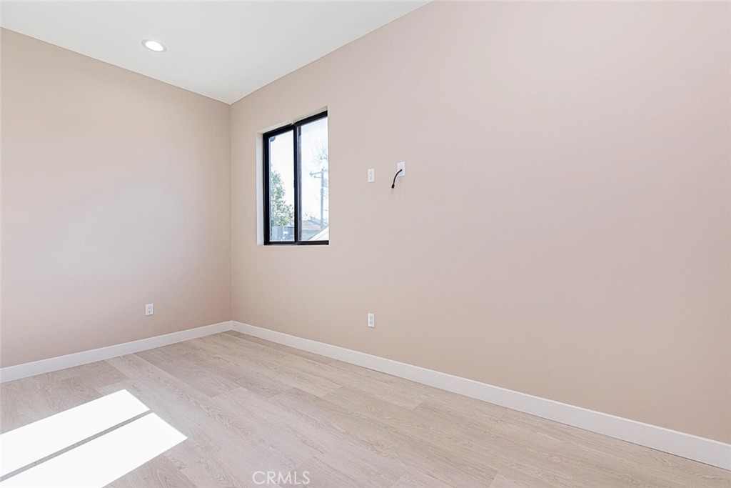 7446 Mammoth Avenue Van Nuys, CA 91405 - Photo 26 of 30 an empty room with a window