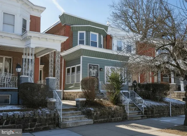 a picture of a bathroom with mirror
