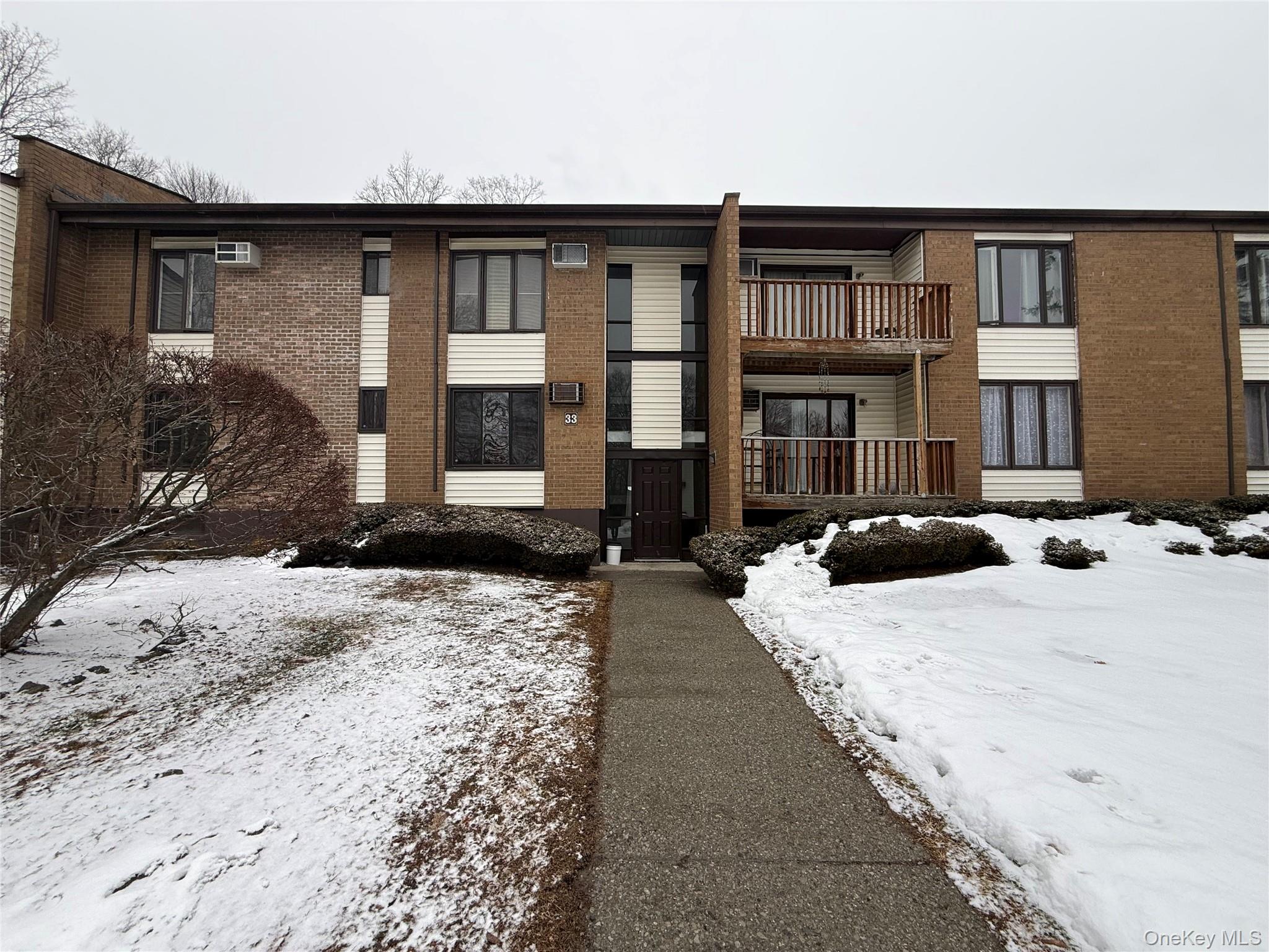 3 Hook Road, Unit 33B Poughkeepsie, NY 12601 - Photo 1 of 9 a front view of a house with yard