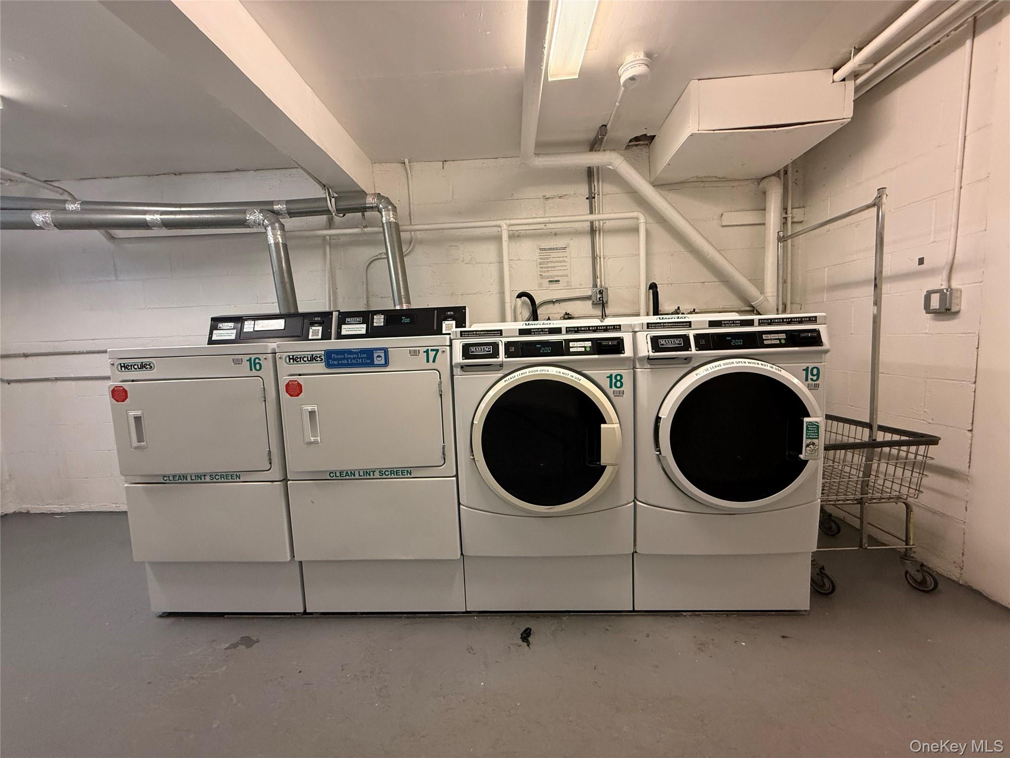 3 Hook Road, Unit 33B Poughkeepsie, NY 12601 - Photo 9 of 9 a utility room with dryer and washer