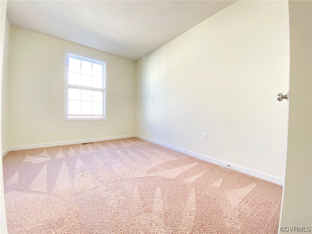 3907 Redbud Road Glen Allen, VA 23060 - Photo 17 of 23 an empty room with a window
