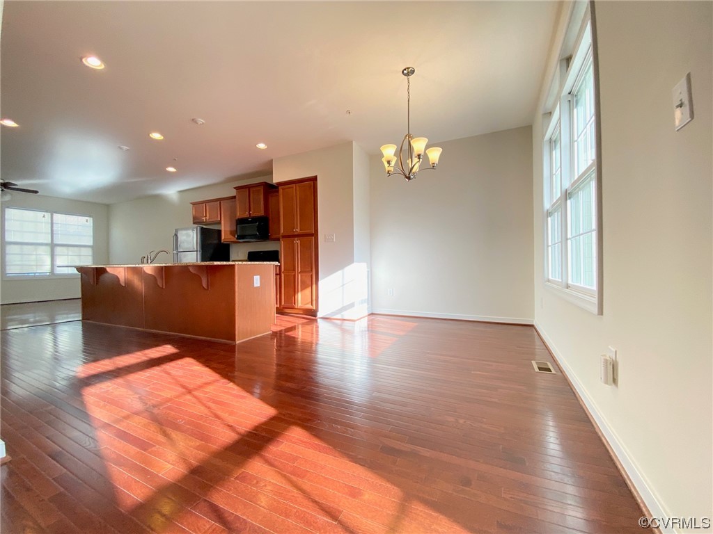 3907 Redbud Road Glen Allen, VA 23060 - Photo 6 of 23 a view of kitchen and hall with wooden floor