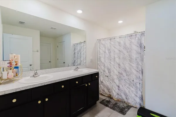 a bedroom with a bed and closet