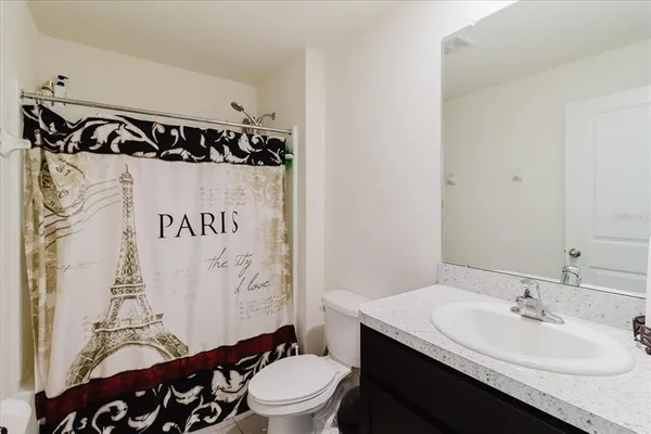 a view of a yard with large trees