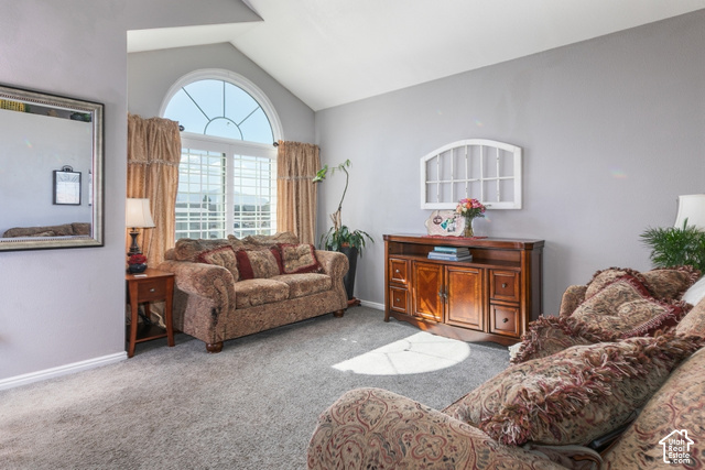 1764 West 1200th Street North Mapleton, UT 84664 - Photo 4 of 35 Vaulted ceiling, arched window, and carpeted flooring
