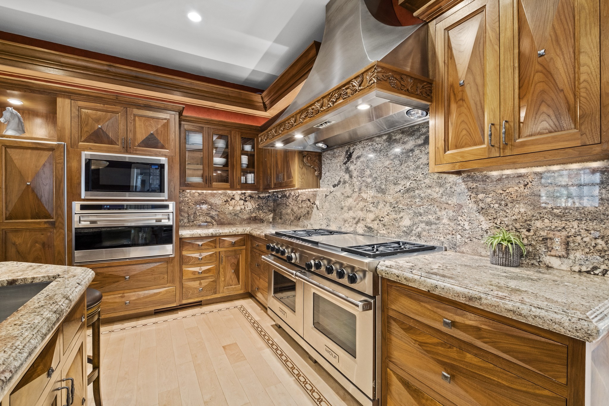 175 Cherokee Dock Road Lebanon, TN 37087 - Photo 12 of 45 a kitchen with stainless steel appliances granite countertop a stove and a sink