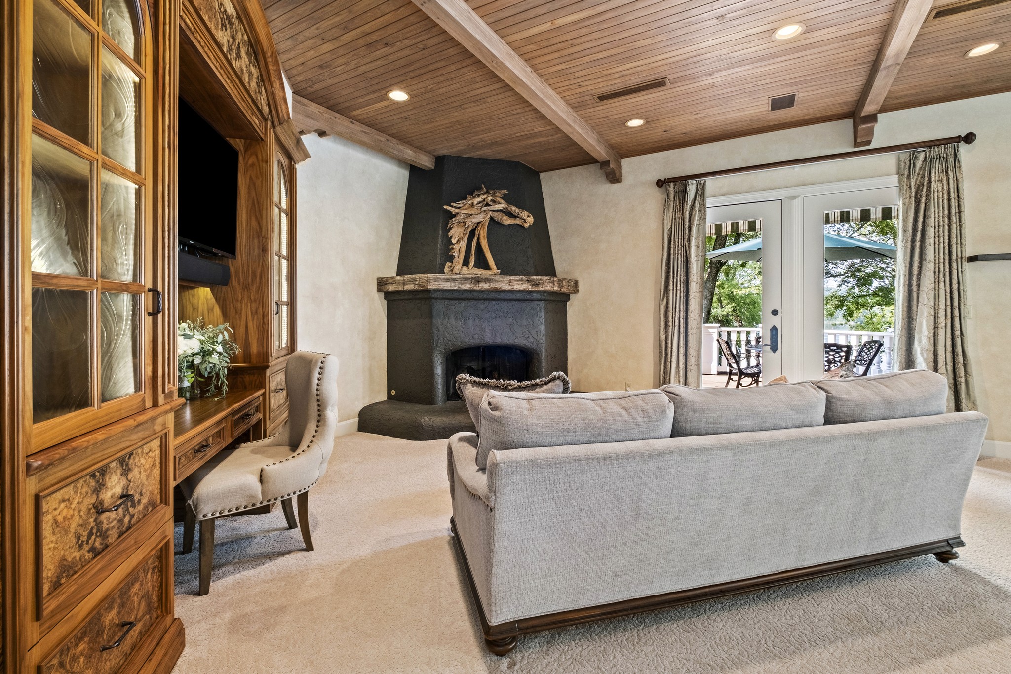 175 Cherokee Dock Road Lebanon, TN 37087 - Photo 15 of 45 a living room with furniture and a fireplace