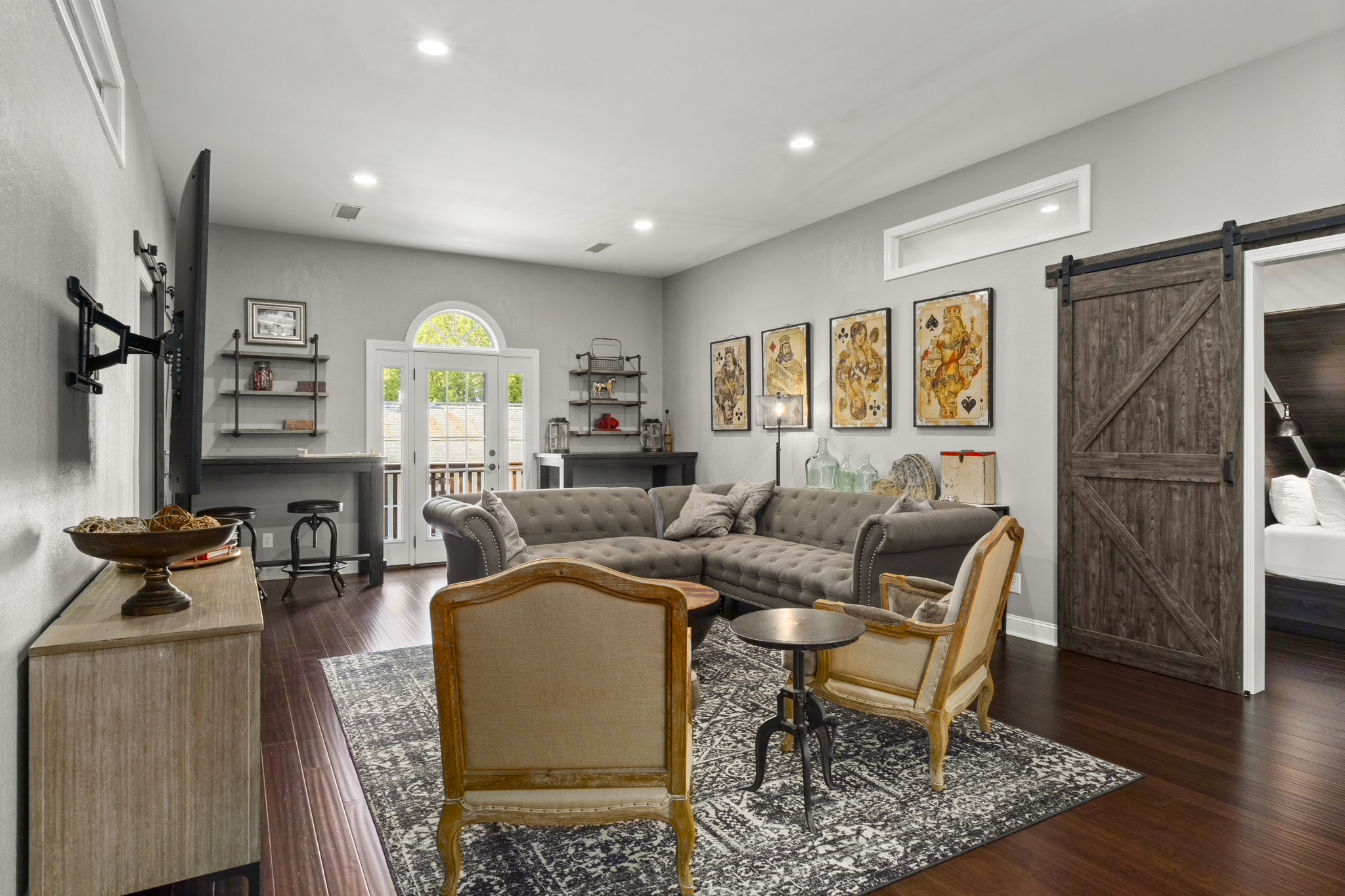 175 Cherokee Dock Road Lebanon, TN 37087 - Photo 36 of 45 a living room with furniture windows and a wooden floor