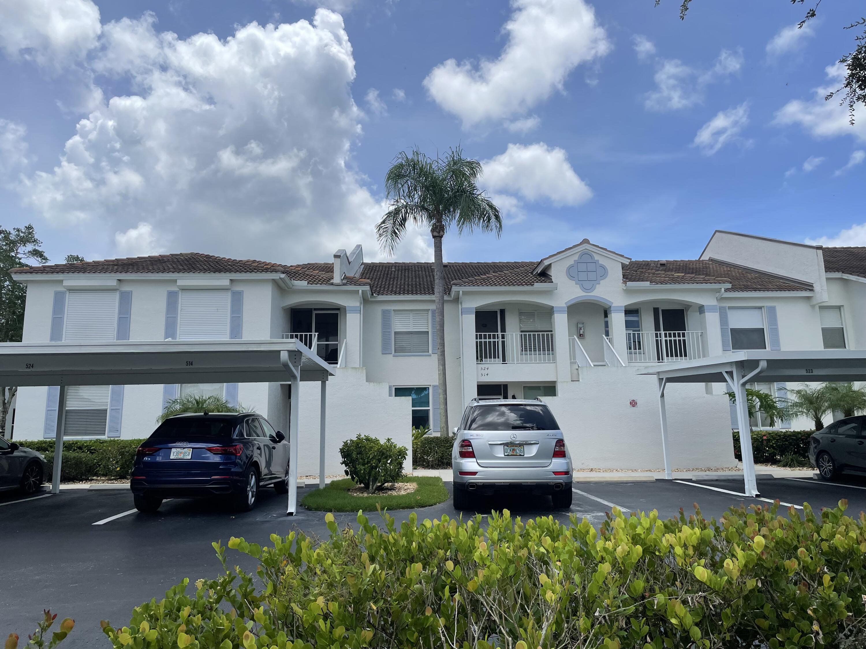 1024 Mainsail, Unit 514 Naples, FL 34114 - Photo 1 of 18 a car parked in front of a house