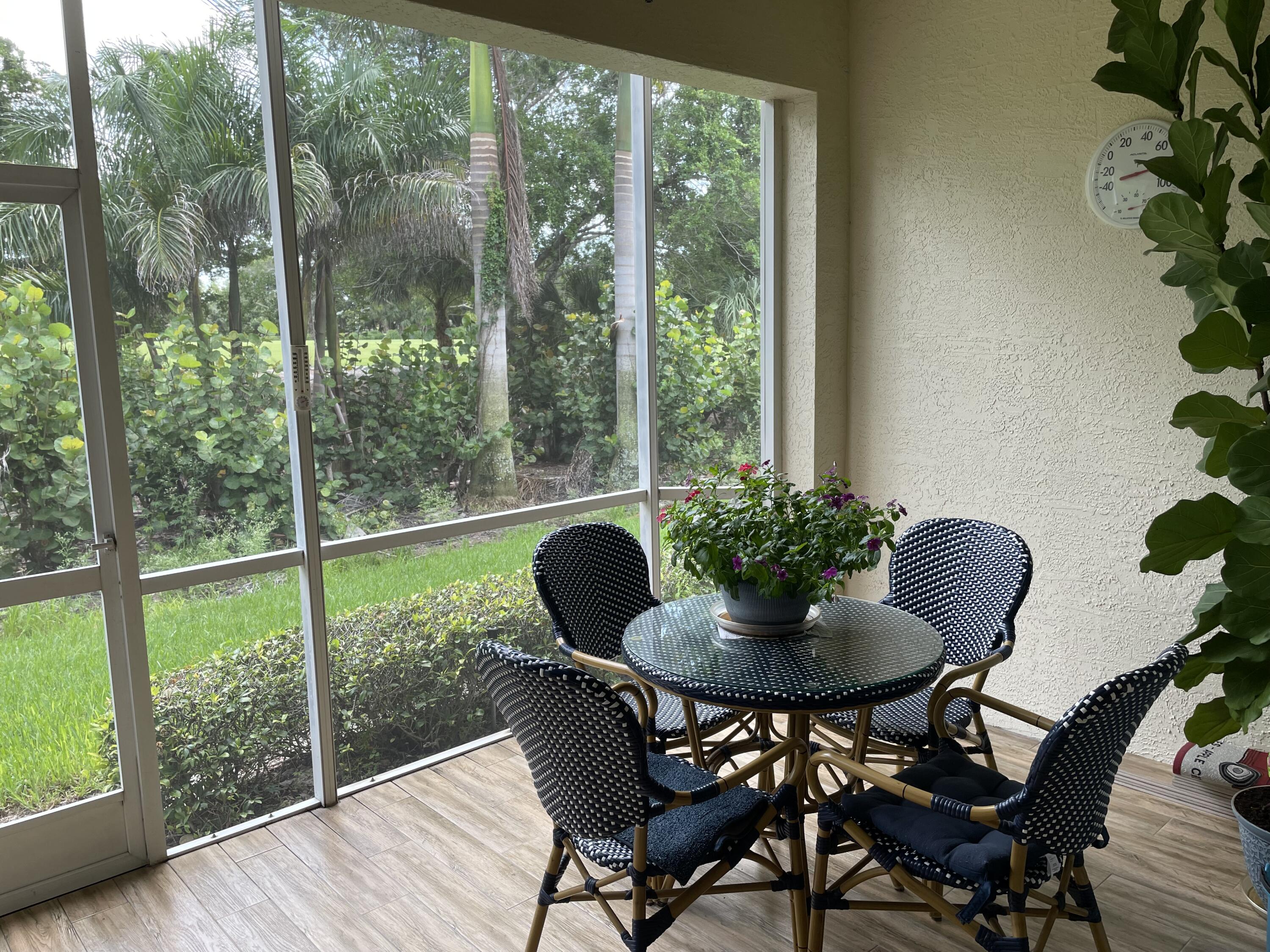 1024 Mainsail, Unit 514 Naples, FL 34114 - Photo 18 of 18 a dining room with furniture and wooden floor