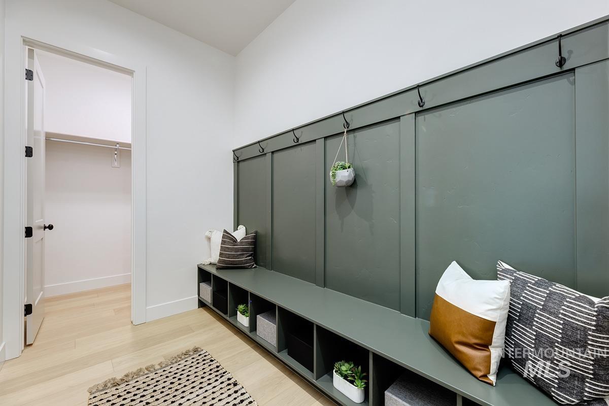 13758 North Ruffed Grouse Way Boise, ID 83714 - Photo 24 of 45 Mudroom with light wood-style floors and baseboards