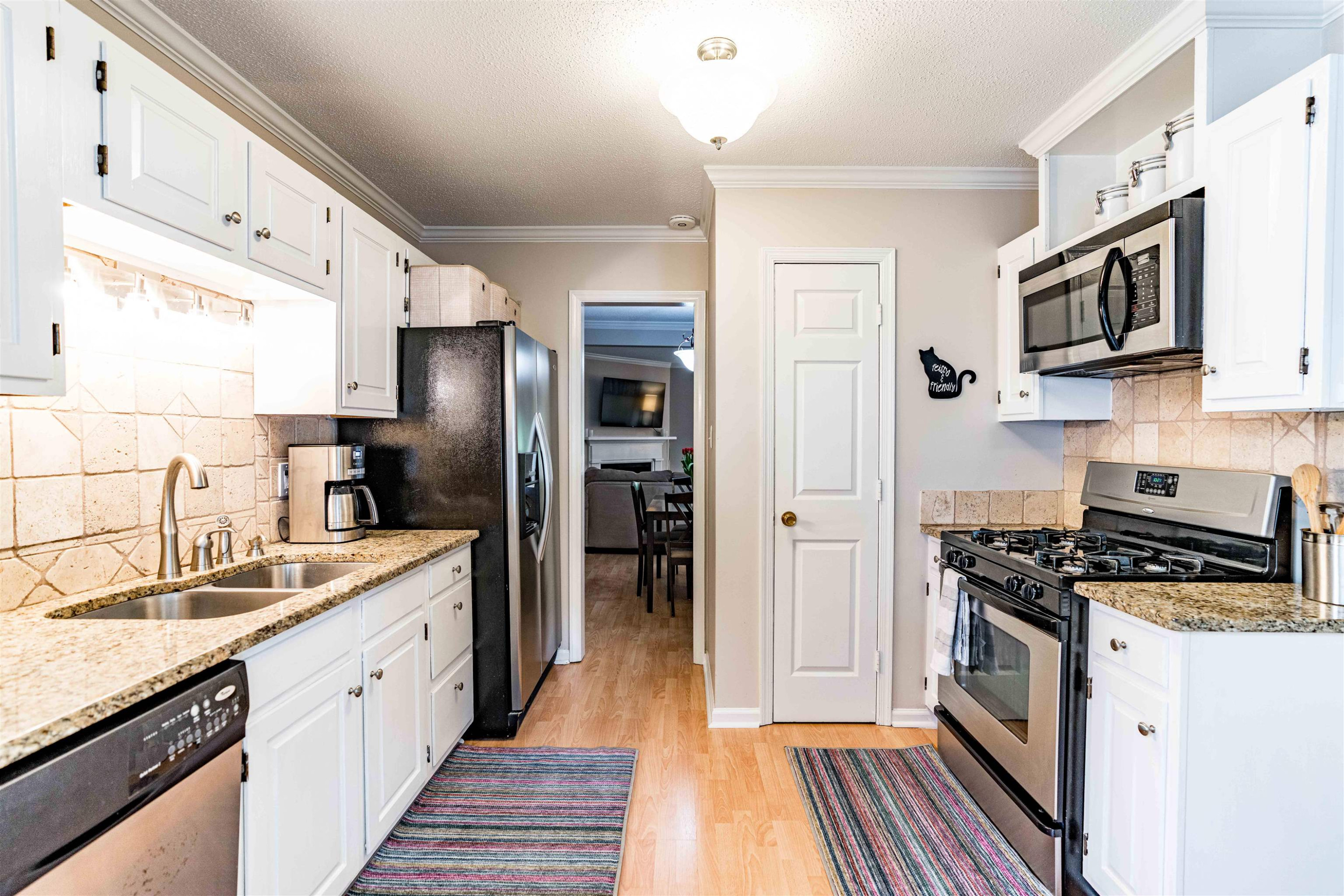6705 Chauncey Drive Raleigh, NC 27615 - Photo 4 of 25 Gas Stove and Granite Counter Tops