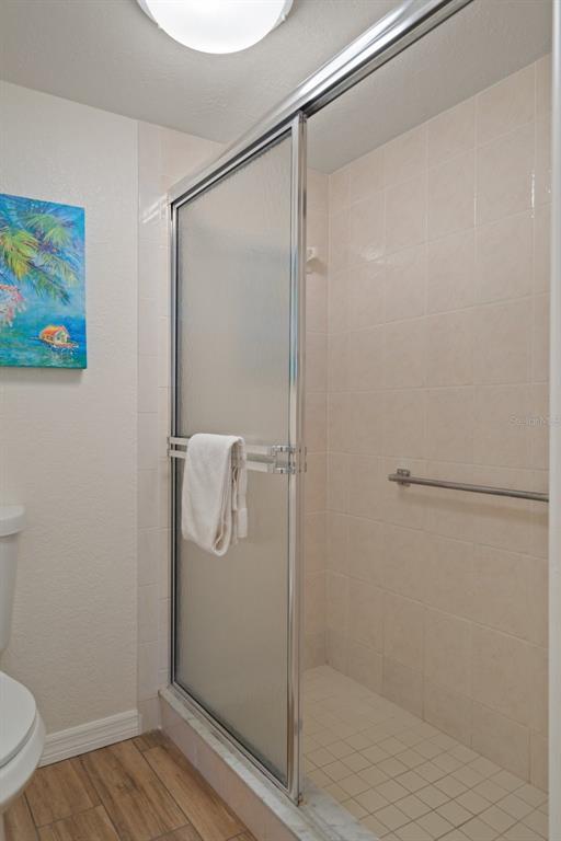 8211 Brent Street, Unit 847 Port Richey, FL 34668 - Photo 25 of 29 a bathroom with a shower