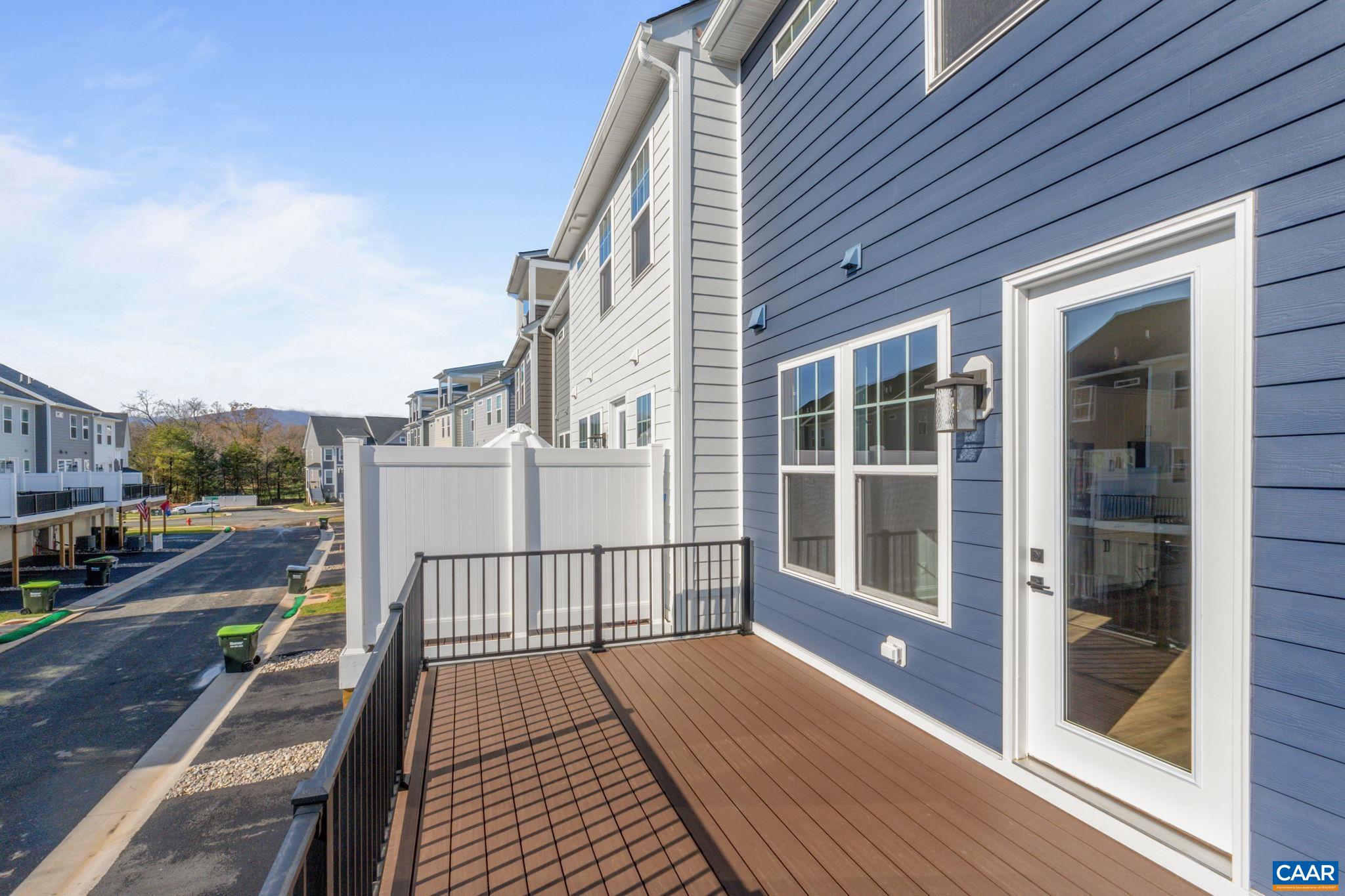 2201 Woodburn Road Charlottesville, VA 22901 - Photo 18 of 43 a view of a balcony with wooden floor