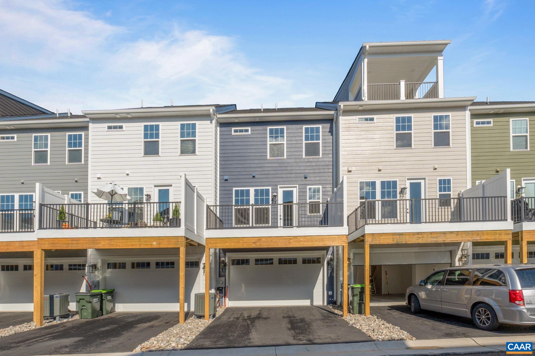2201 Woodburn Road Charlottesville, VA 22901 - Photo 35 of 43 a front view of a building with a parking space