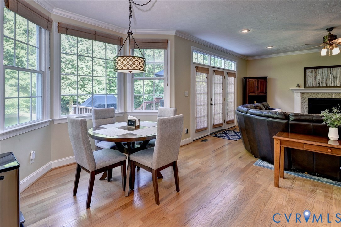 4015 Cold Spring Road Williamsburg, VA 23188 - Photo 15 of 57 Bay window dining area featuring a decorative chan