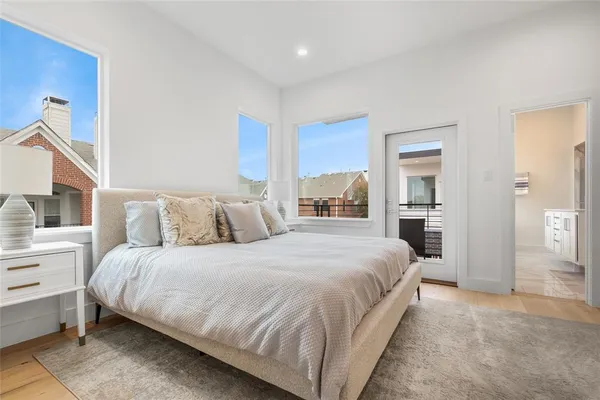 a bedroom with a bed and a view of bedroom