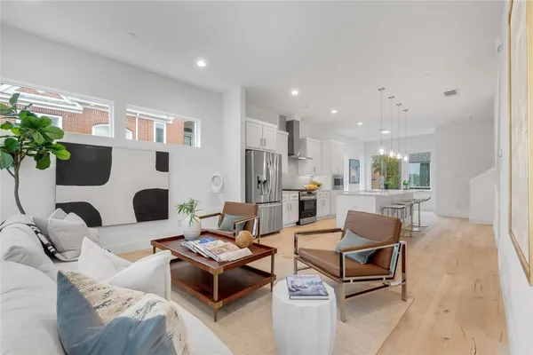 a living room with furniture and a table