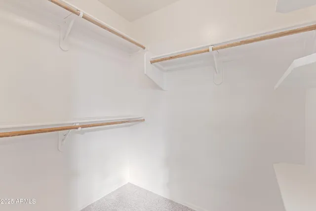 a view of a room with racks on the wall