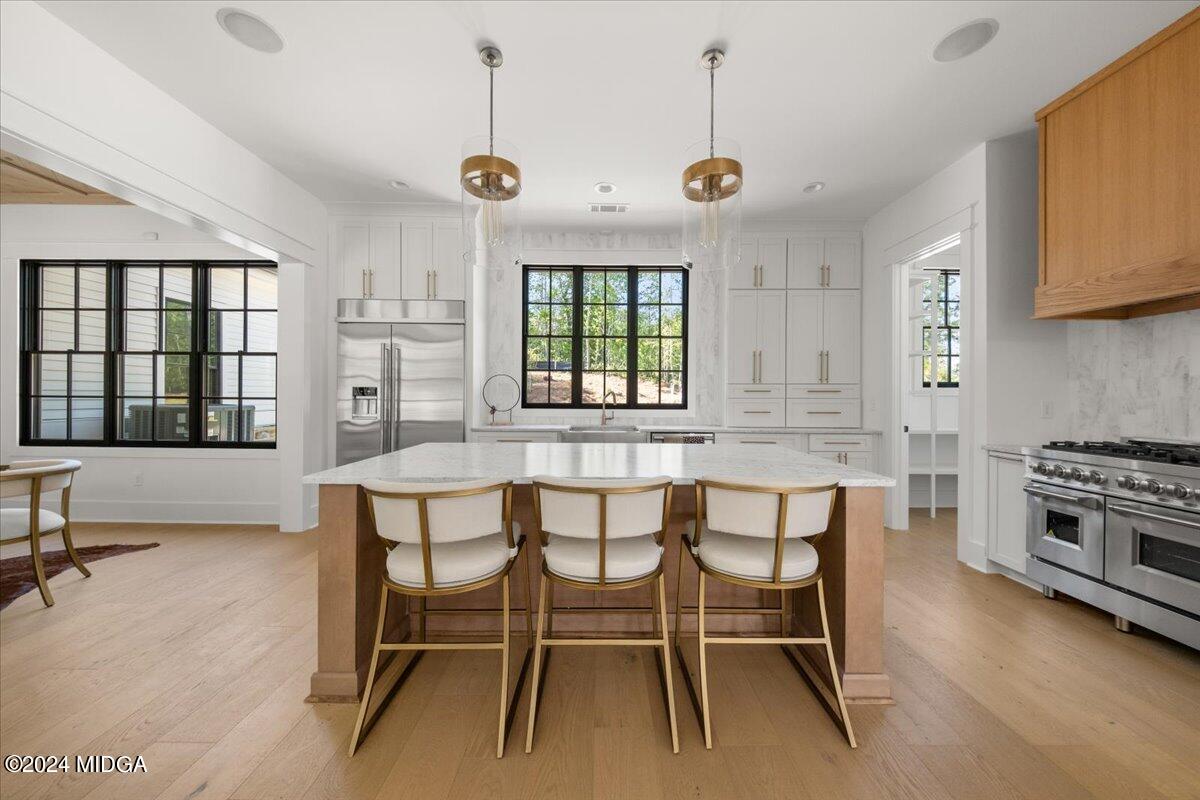 110 Birch Circle Forsyth, GA 31029 - Photo 11 of 44 a dining room with furniture and window