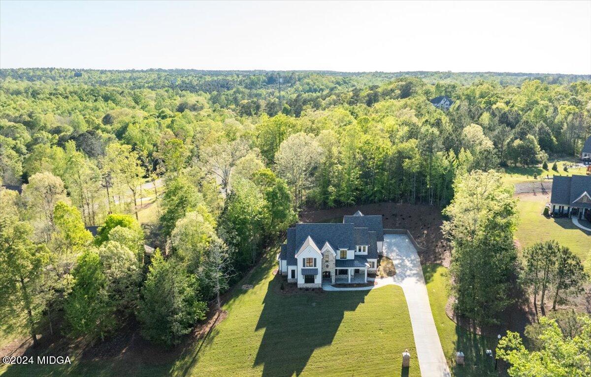 110 Birch Circle Forsyth, GA 31029 - Photo 2 of 44 a view of a swimming pool with a patio