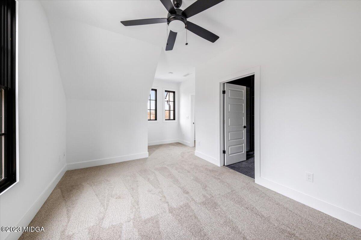 110 Birch Circle Forsyth, GA 31029 - Photo 28 of 44 an empty room with fan and windows
