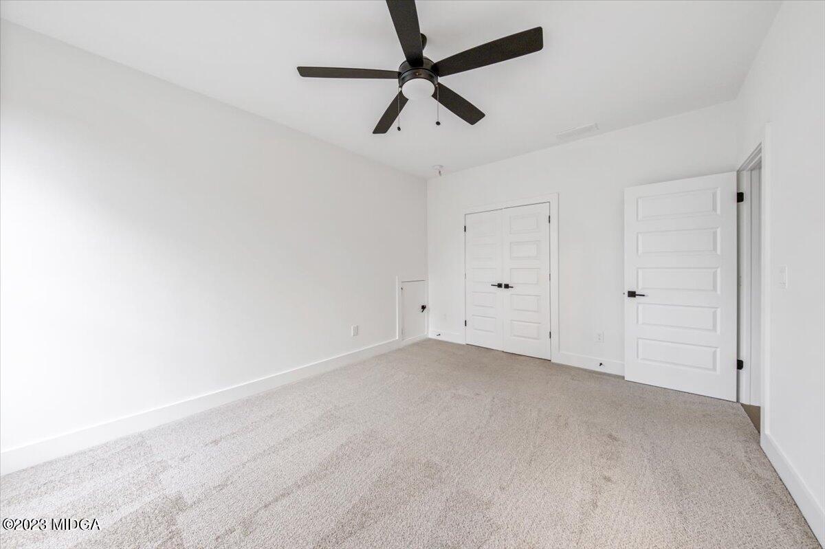 110 Birch Circle Forsyth, GA 31029 - Photo 30 of 44 a view of an empty room