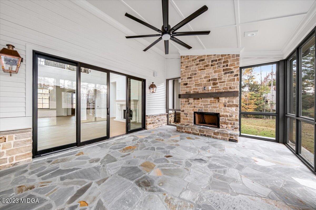110 Birch Circle Forsyth, GA 31029 - Photo 36 of 44 a view of an empty room with a fireplace and a window